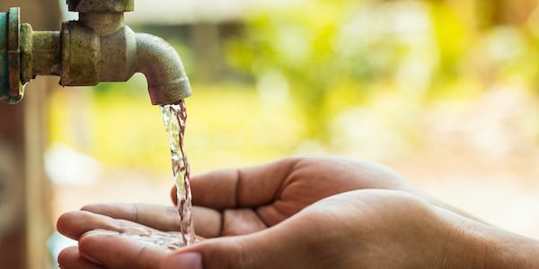 hand open for drinking tap water