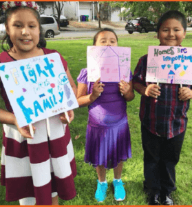 kids with advocacy signs