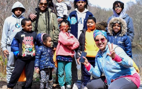 Sharee Harrison leads youth from the Orange and East Orange community in the South Mountain Reservation along the Fairy Trail. Trail Mix serves as a guided tour for youth, seniors, and everyone in between to be introduced or rediscover the accessible land preserved close to them.